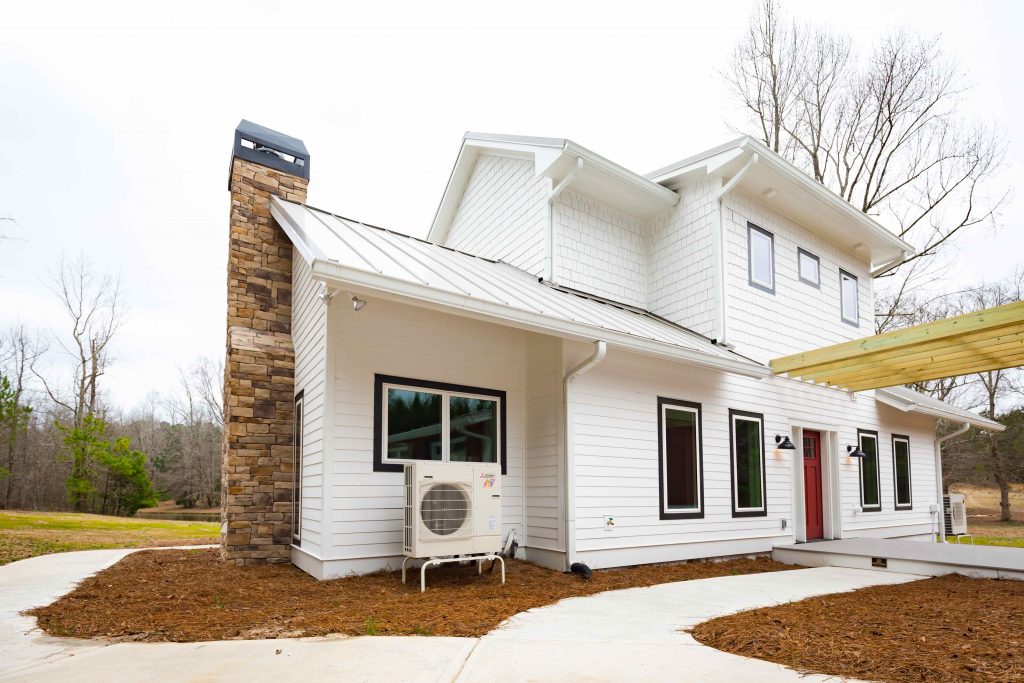 Modern heat pump on new construction house